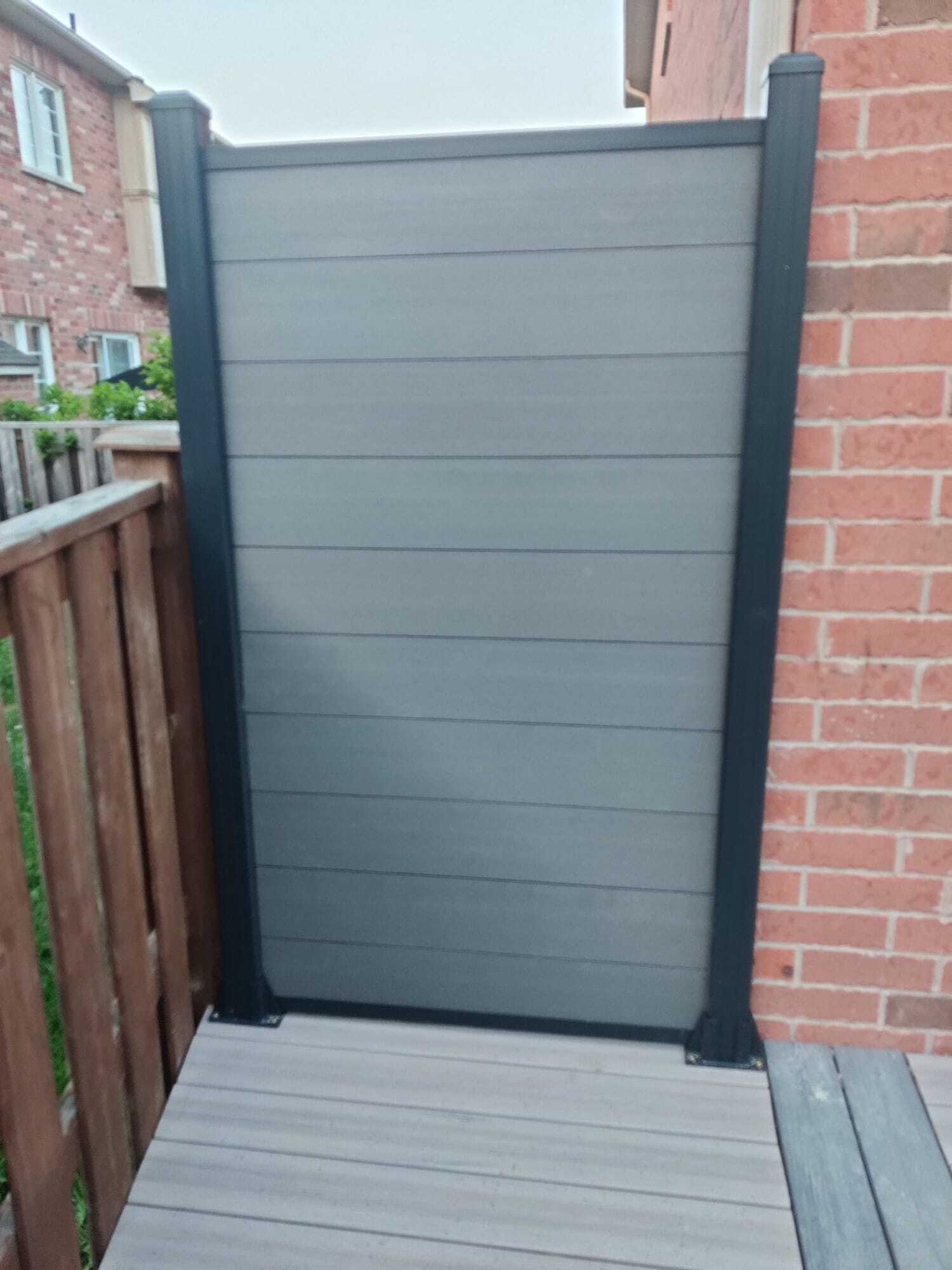 Composite fence installed by Stefano Fence & Deck in the Greater Toronto Area — Composite Privacy Fence Panel with Aluminum Posts